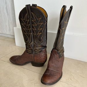Genuine leather cowboy boots. Dark brown with yellow stitching.